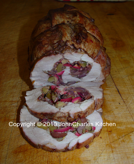 Roast Tenderloin of Pork Stuffed with Black and Green Olives, Asiago and Locatelli Cheeses, Basil and Chianti Wine