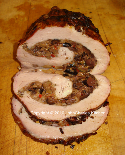Roast Tenderloin of Pork Stuffed with Black and Green Olives, Asiago and Locatelli Cheeses, Basil and Chianti Wine
